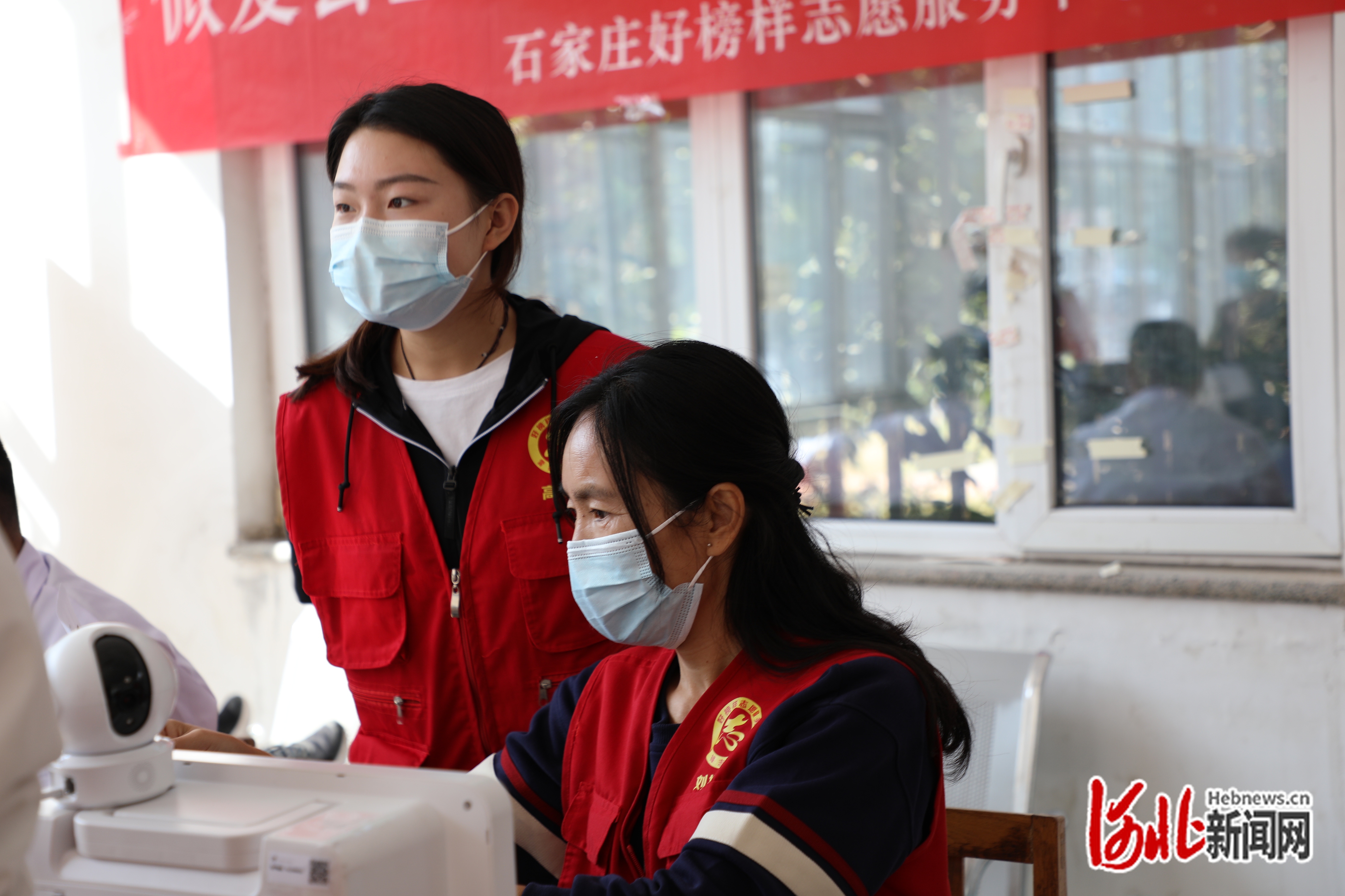 1664881087720759.jpg 志愿者身影.JPG